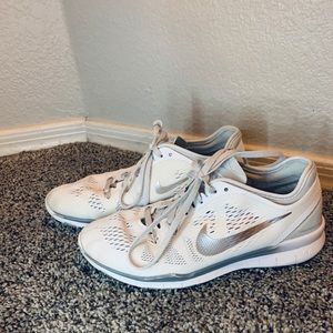 White and Silver Nike Frees